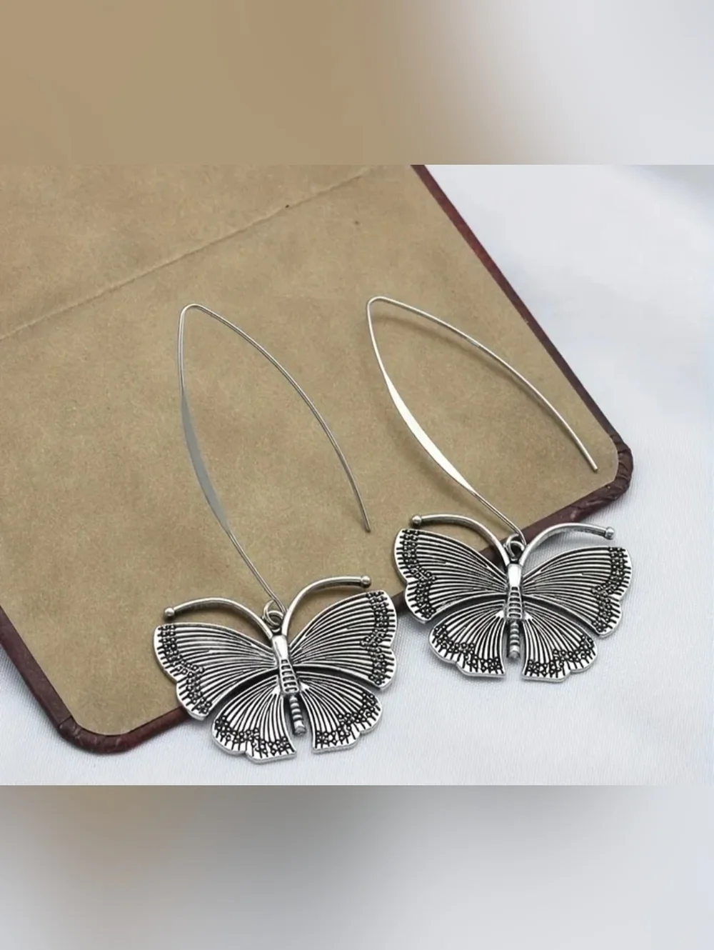 Trendy boutique detailed butterfly